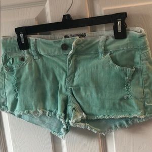 Mint colored jean shorts